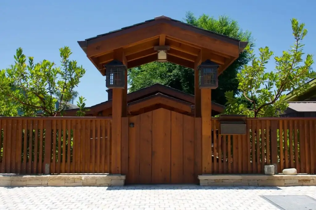 How to Install an Arbor with Gate Access Through Fence